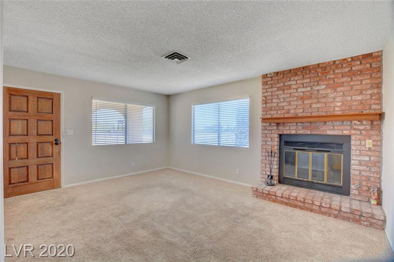 Living room w/ fireplace in Cameron Street home, Las Vegas